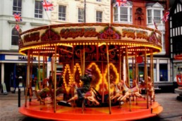 John Biddall Leisure | ADULT ATTRACTIONS | Stage Lighting Hire | Stage Hire | Soft Play Hire | Small Carousel| Merry Go Round | GENERATOR HIRE | Funfair Ride | Dodgems | Carousel | Bouncy | Bouncy Castle